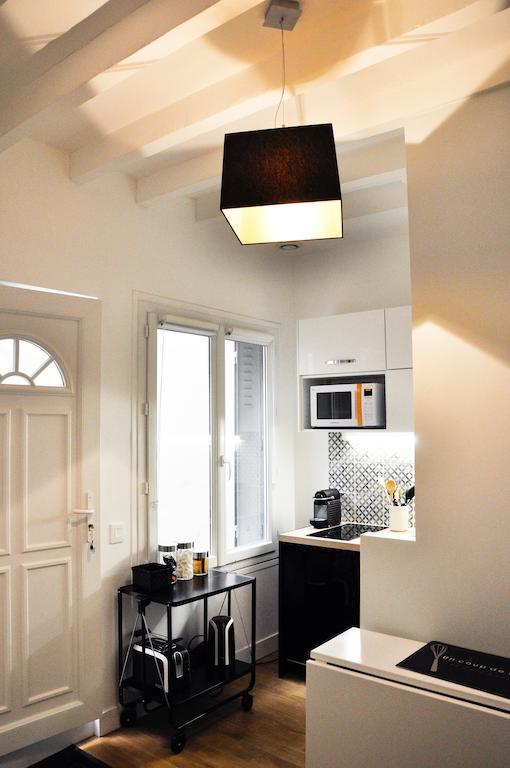 Duplex De Charme Au Coeur De Montmartre Lägenhet Paris Rum bild