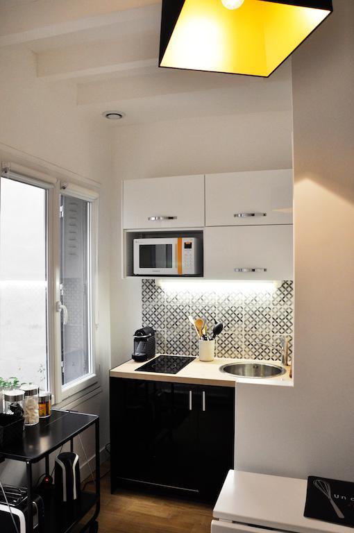 Duplex De Charme Au Coeur De Montmartre Lägenhet Paris Rum bild